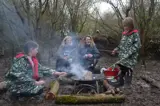 Sitting round a smokey firepit